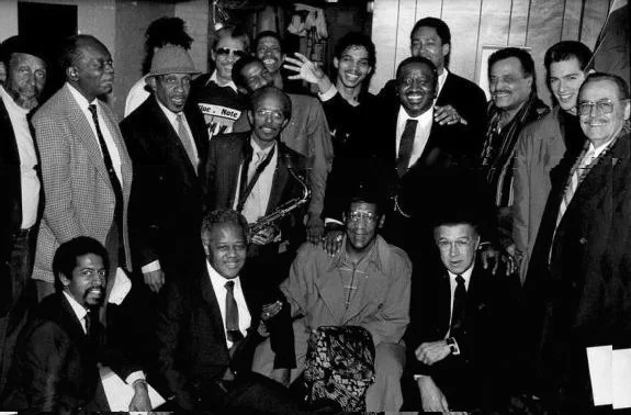 Standing Front Row: Percy Heath, Hank Jones, Milt Jackson, Jimmy Heath, Bernard Purdie, Arthur Prysock Knealing Front Row: Bill Brower, Slide Hampton, Bill Cosby, Kenny Burrell Back row: Frank Foster, Al Gray, Leon Lee Dorsey, Jon Faddis